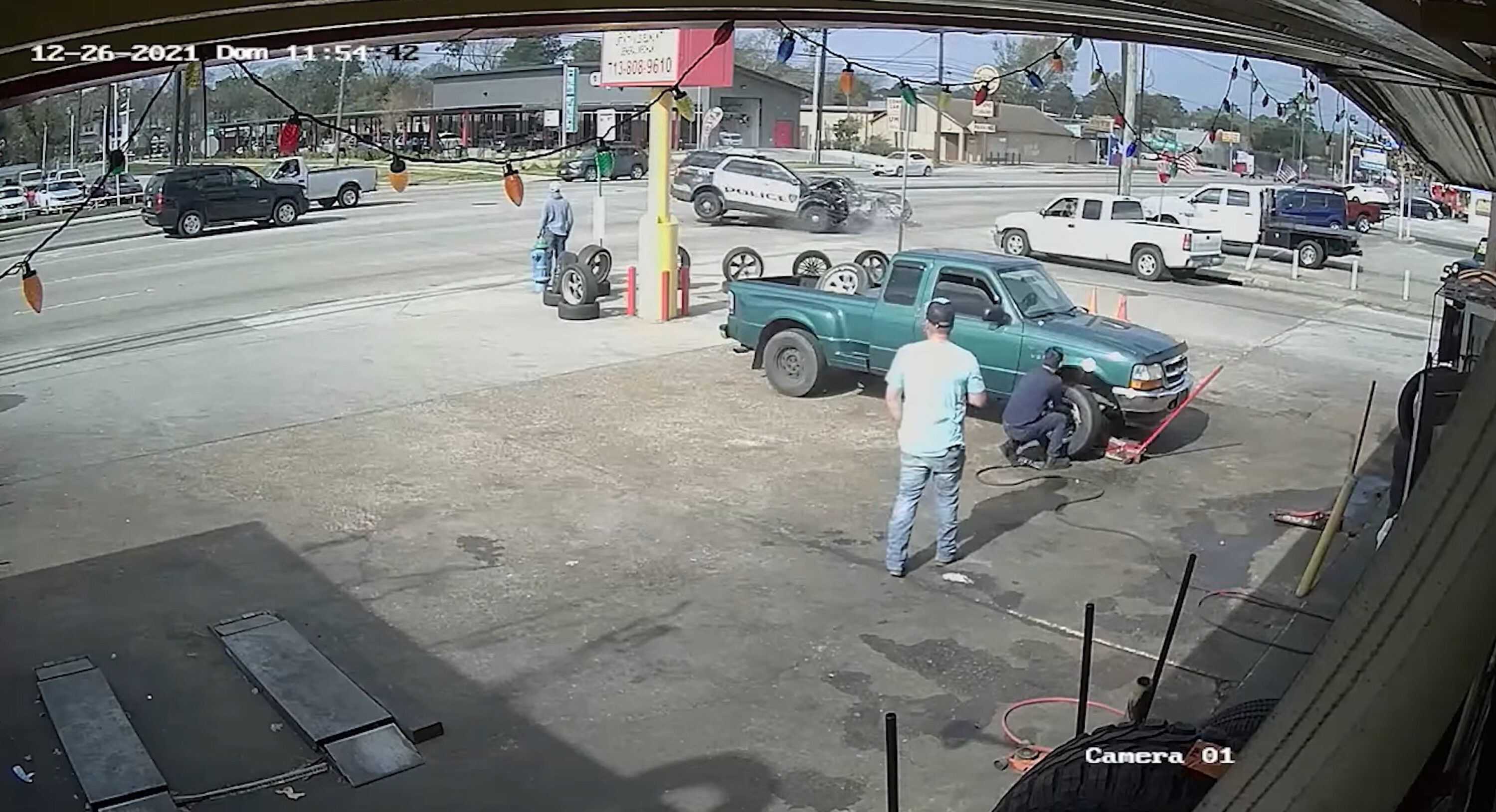 Surveillance video of the Dec. 26, 2021, crash involving an HPD officer.