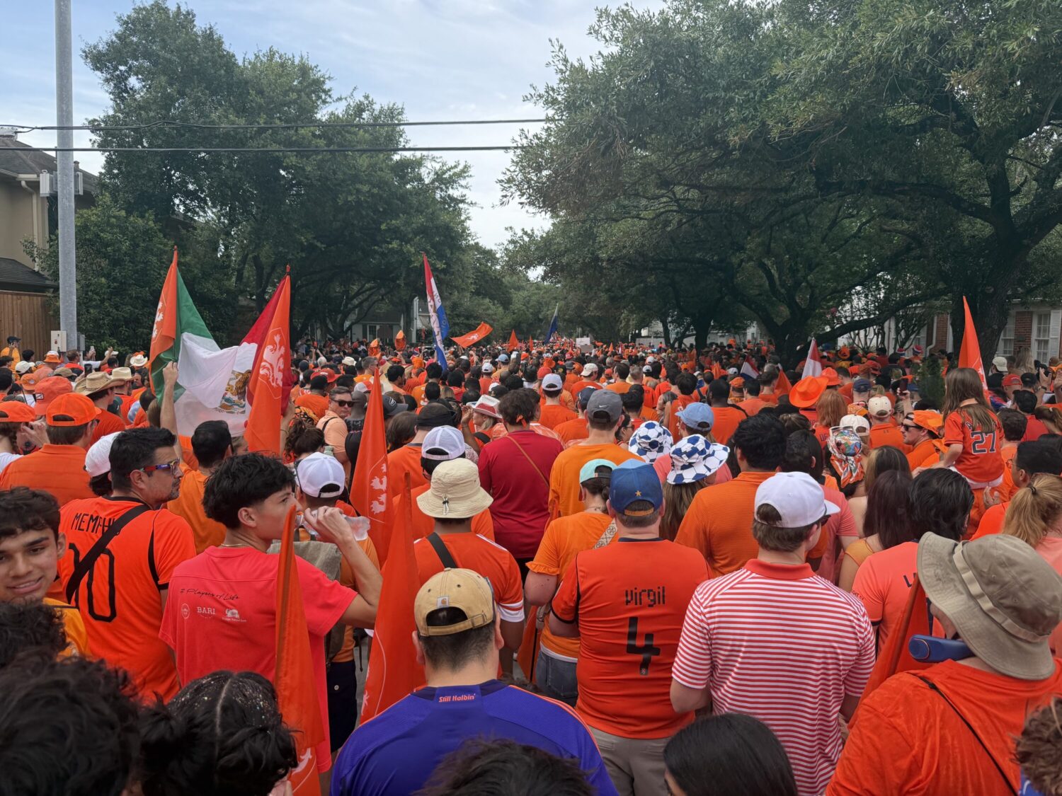 Thousands of Dutch and Swedish fans march to Houston Stadium ahead of ...