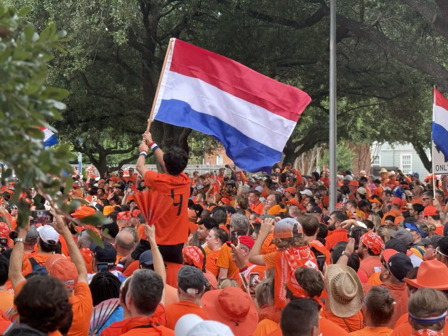 Thousands of Dutch and Swedish fans march to Houston Stadium ahead of World Cup match