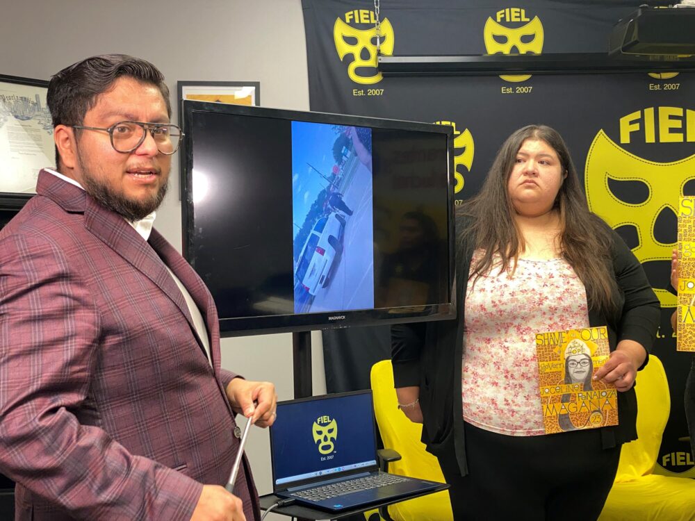 FIEL Executive Director Cesar Espinoza shows video footage of 23-year-old Joceline Penaloza Magana's arrest by ICE agents during a press conference on August 26, 2026.