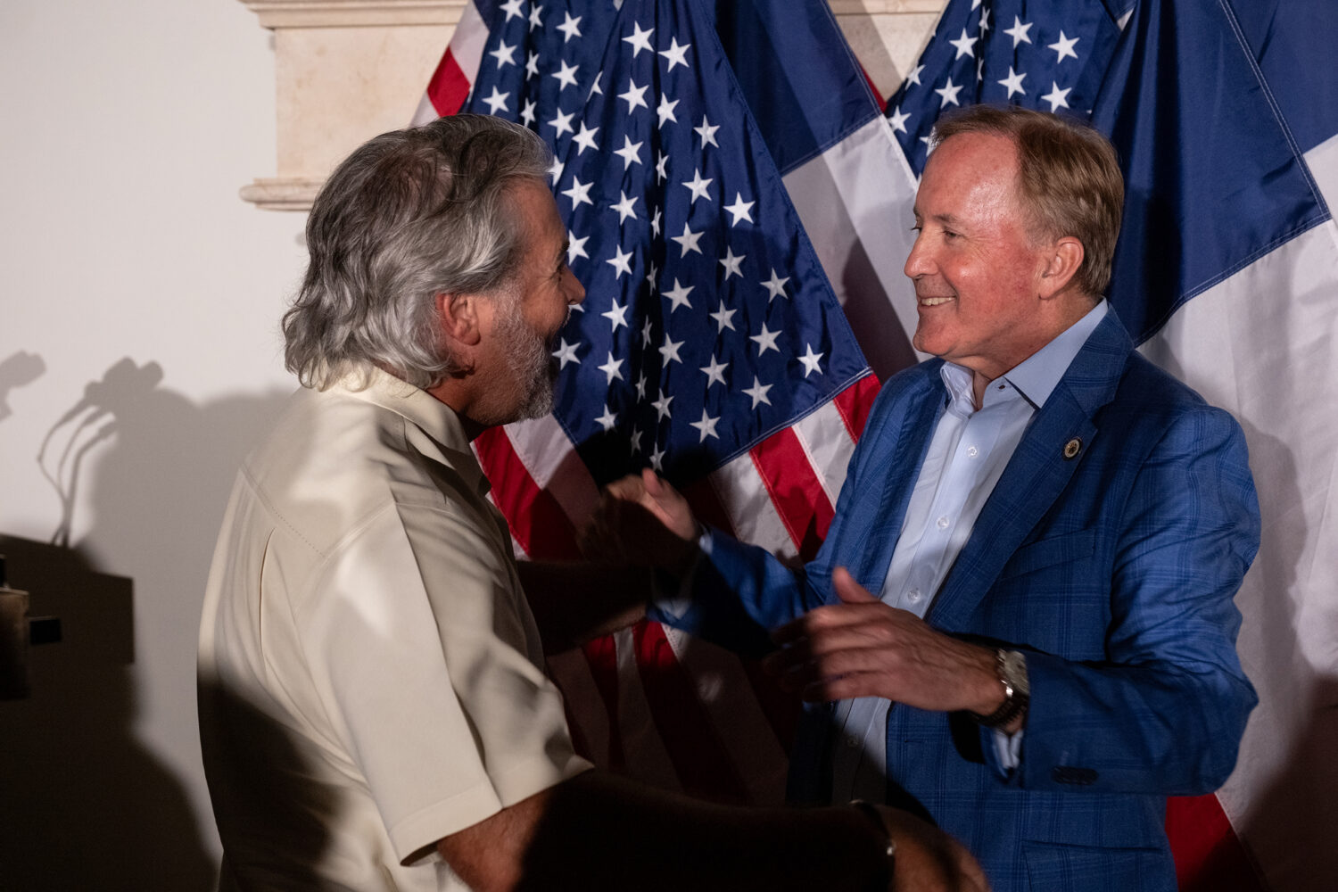 Texas Attorney General Ken Paxton, the Republican nominee for U.S. Senate, greets a supporter during a campaign stop in Longview on Sept. 15, 2026.