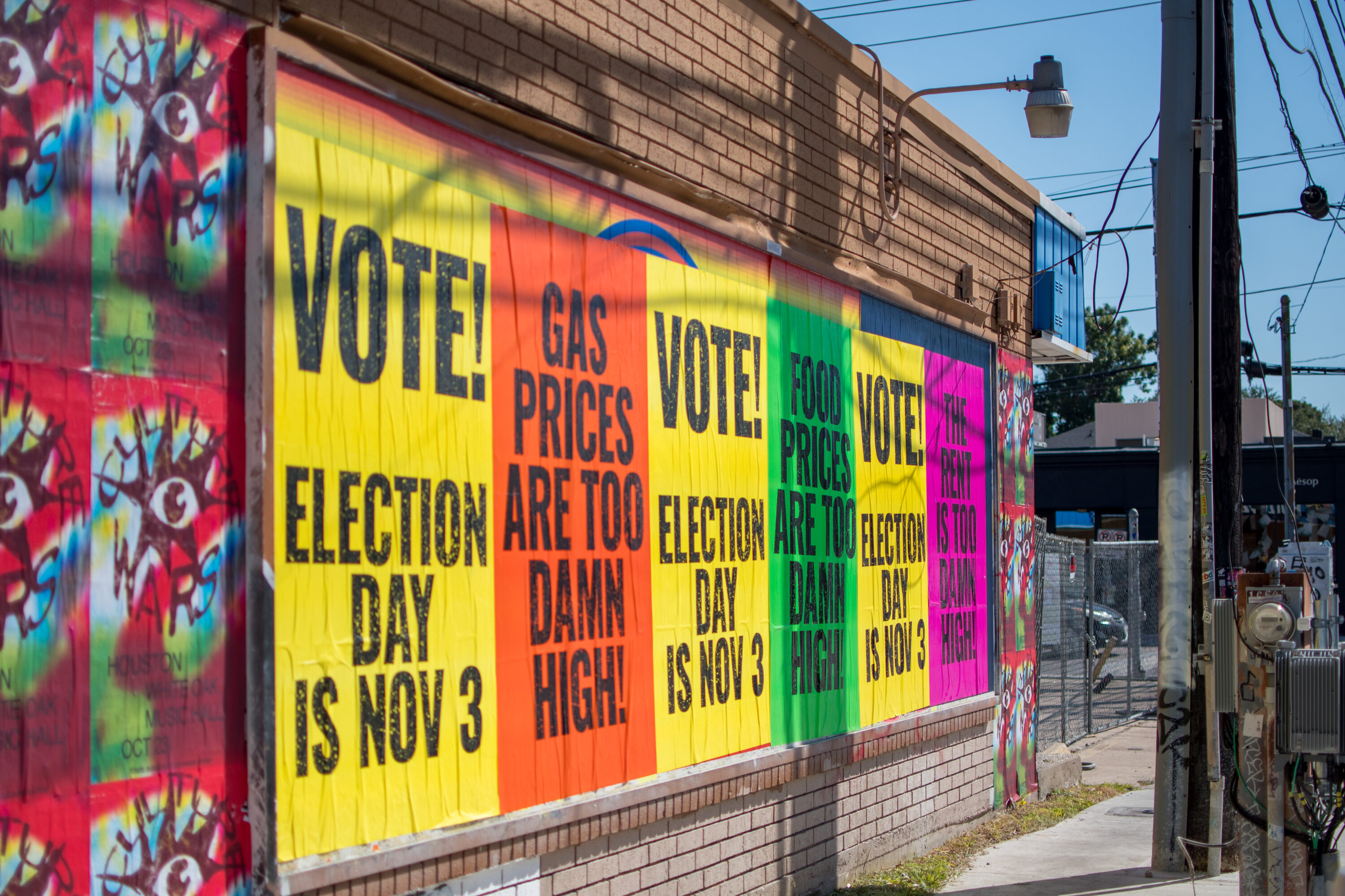 A series of posters at the corner of Westheimer Road and Dunlavy Street in Houston on Oct. 23, 2026.